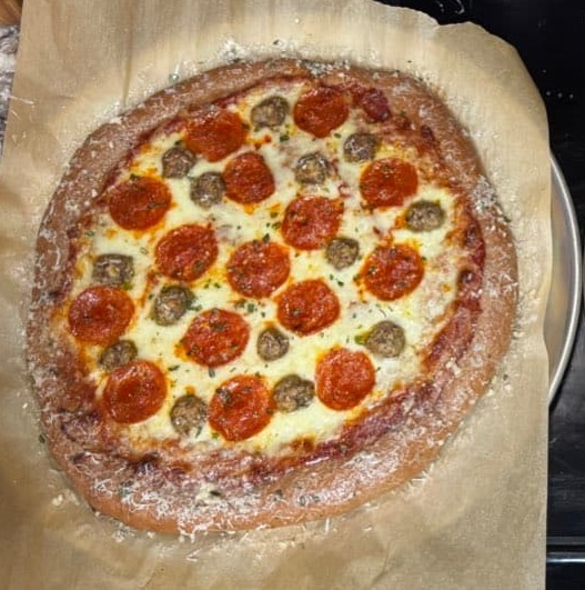 Pizza wall showcasing community pizza creations and inspiring pizza making ideas from fellow pizza enthusiasts
